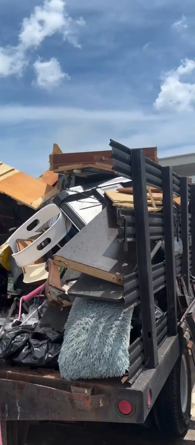 Truck loaded with furniture and junk from the house
