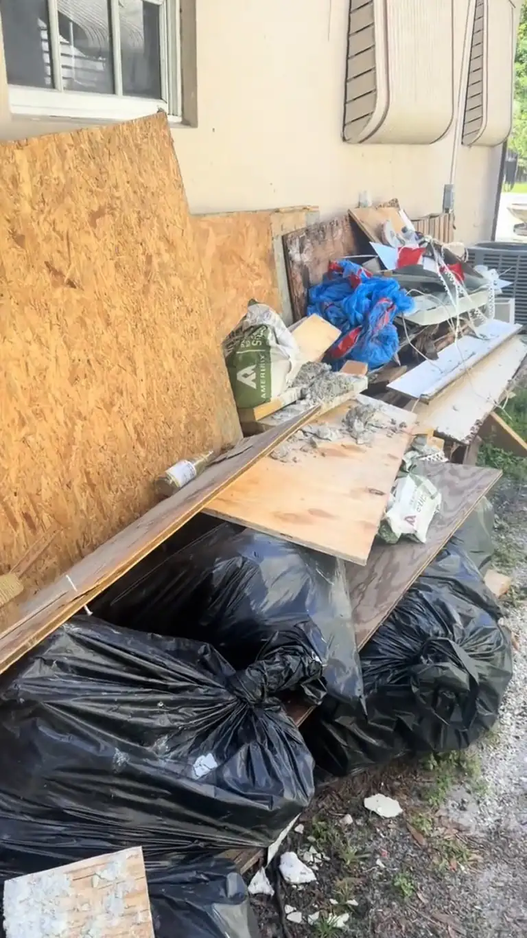 Debris along the house wall