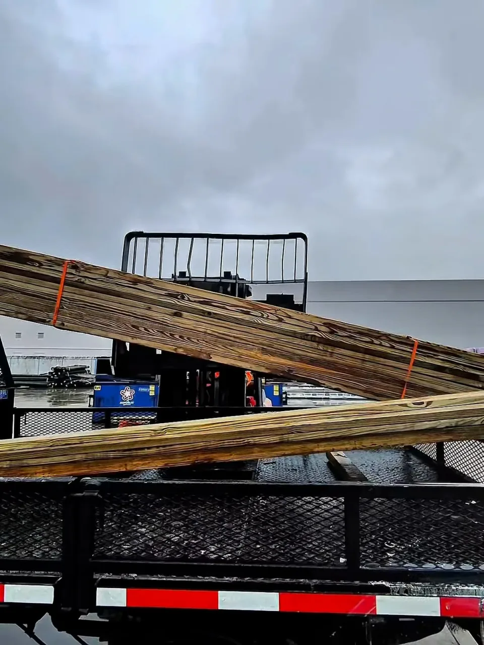 Building materials waiting at a store pickup area