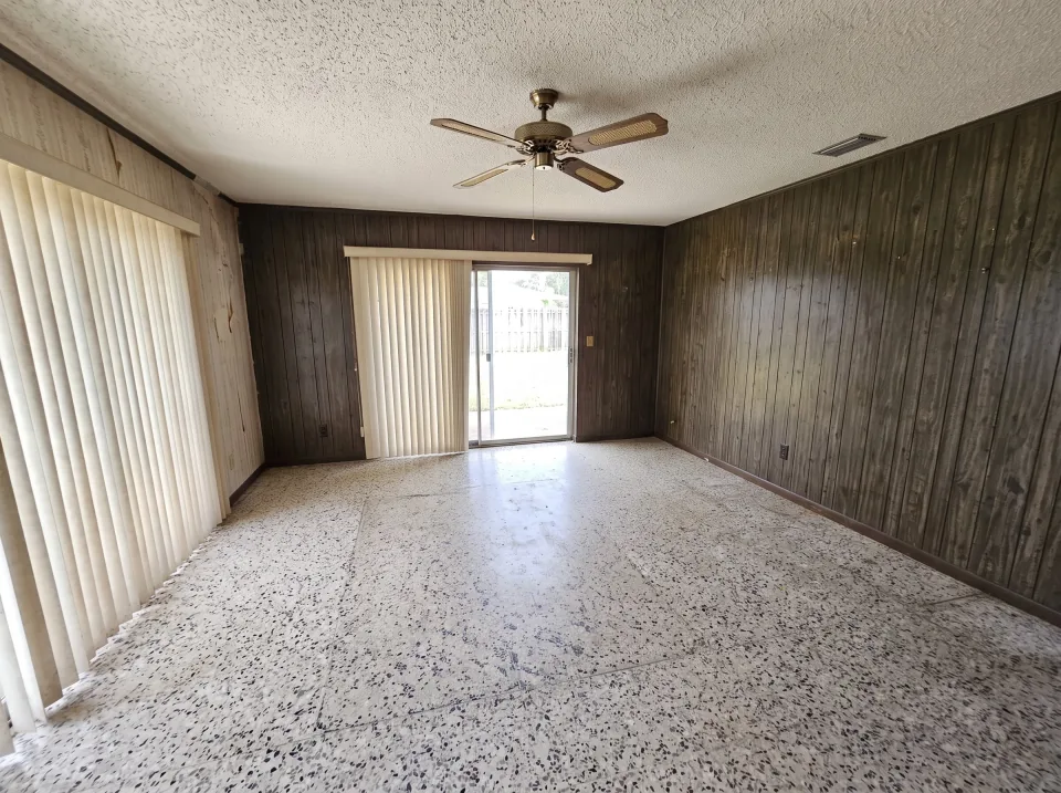 Illustration, after: the sofa, entertainment center, recliner and rug removed