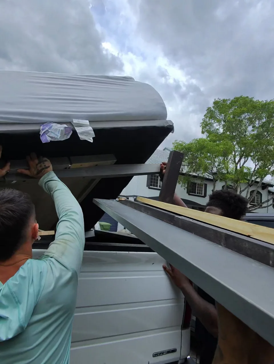 Loading a bed frame into the truck